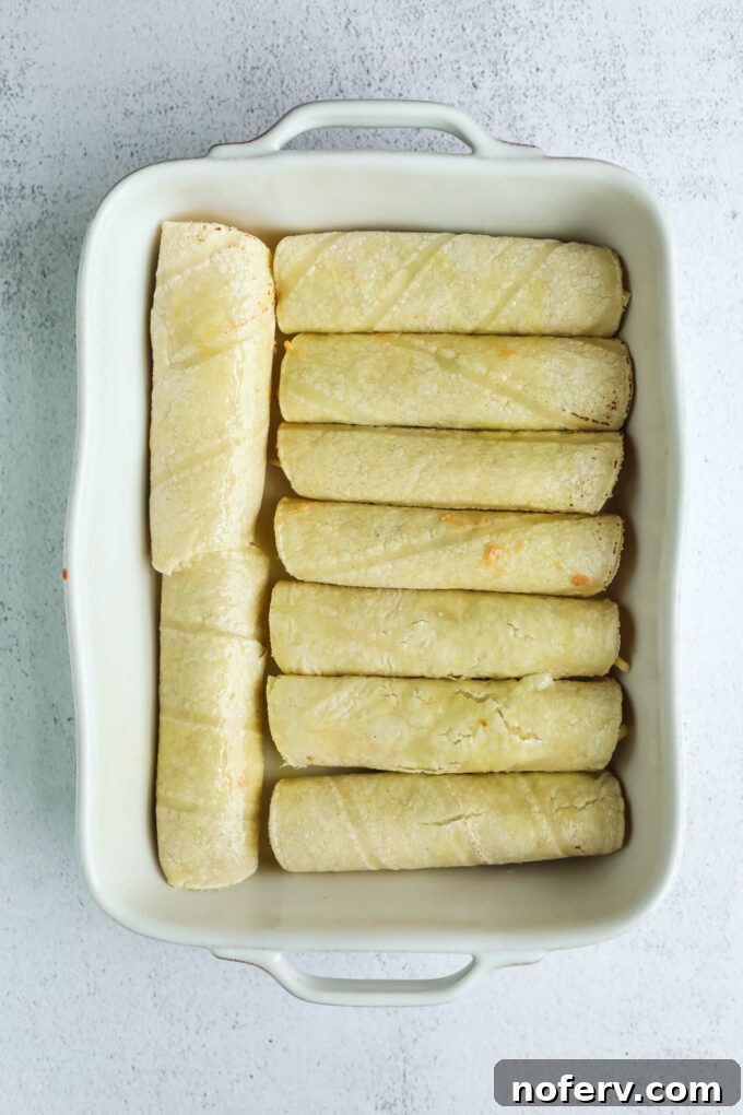Step 3: Rolling and arranging taquitos in a pan