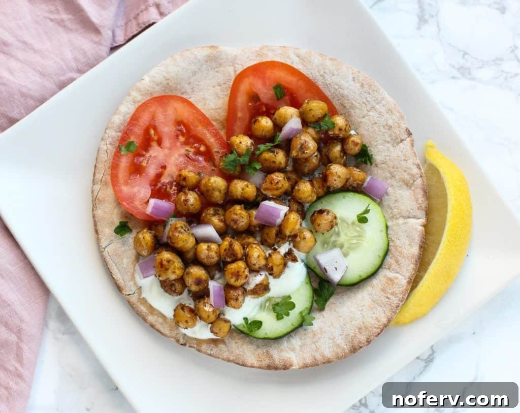 A vibrant chickpea gyro with fresh ingredients, ready to be enjoyed.
