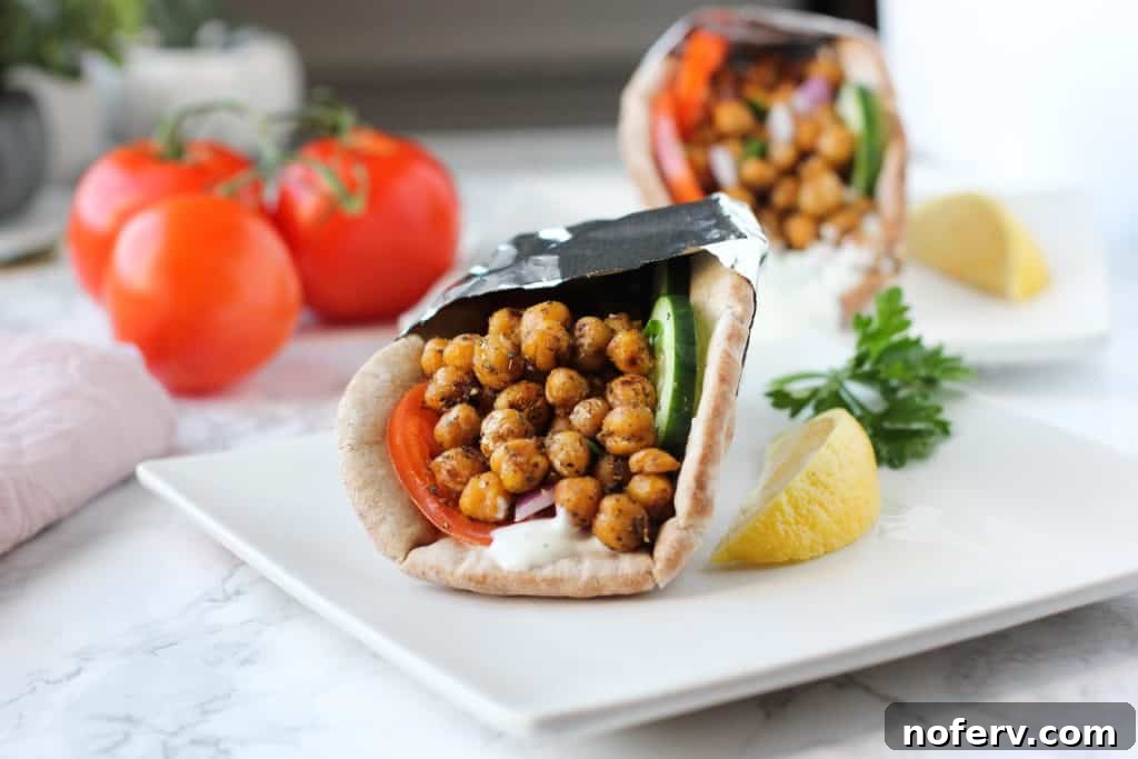 Plated chickpea gyros, showcasing the generous filling and appetizing presentation.