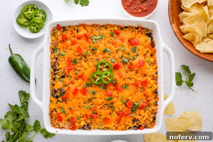 Easy Mexican Quinoa Bake, a flavorful vegetarian casserole with quinoa, black beans, and vegetables.