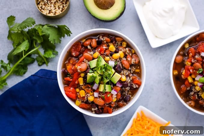 Slow Cooker Quinoa Chili, an easy one-pot meal loaded with beans, corn, and spices, perfect for minimal prep.