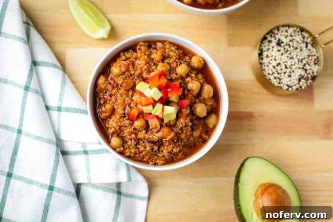 Chickpea and Quinoa Stew, packed with spices like paprika and chipotle peppers, perfect for an Instant Pot or Crockpot.