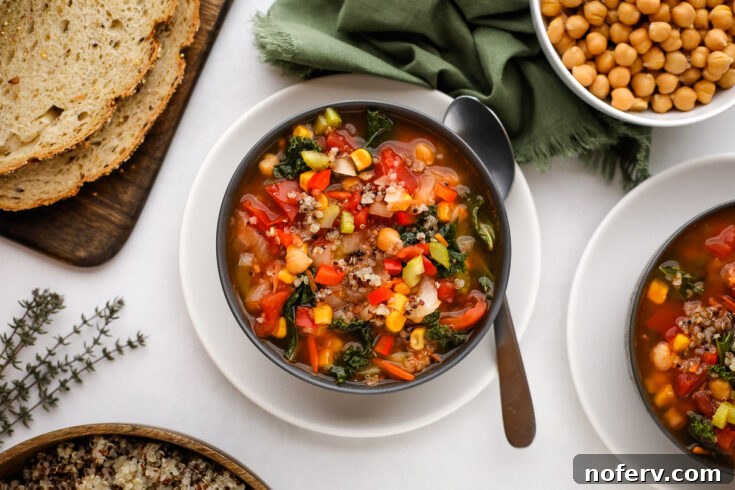 Quinoa Vegetable Soup, a flavorful and wholesome soup packed with quinoa, chickpeas, and spices.