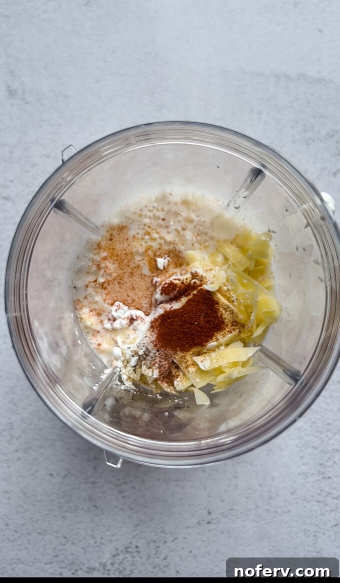 Silky Cottage Mac & Cheese 3 Blending cottage cheese, milk, cornstarch, cheddar cheese, and seasonings