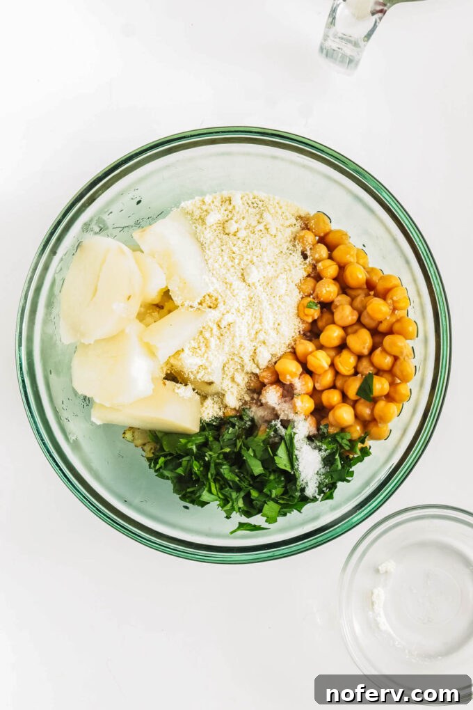 Golden Chickpea Burger Delights 6 Bowl with mashed chickpea burger mixture.