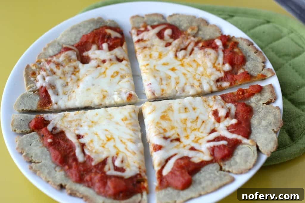 Delicious single-serving gluten-free quinoa pizza with fresh vegetable toppings