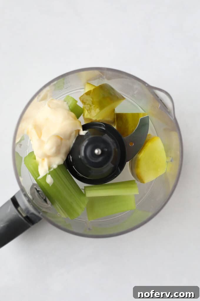 Briny Dill Pickle Chickpea Salad 3 Step 1: Combine mayo, celery, and dill pickle in a food processor