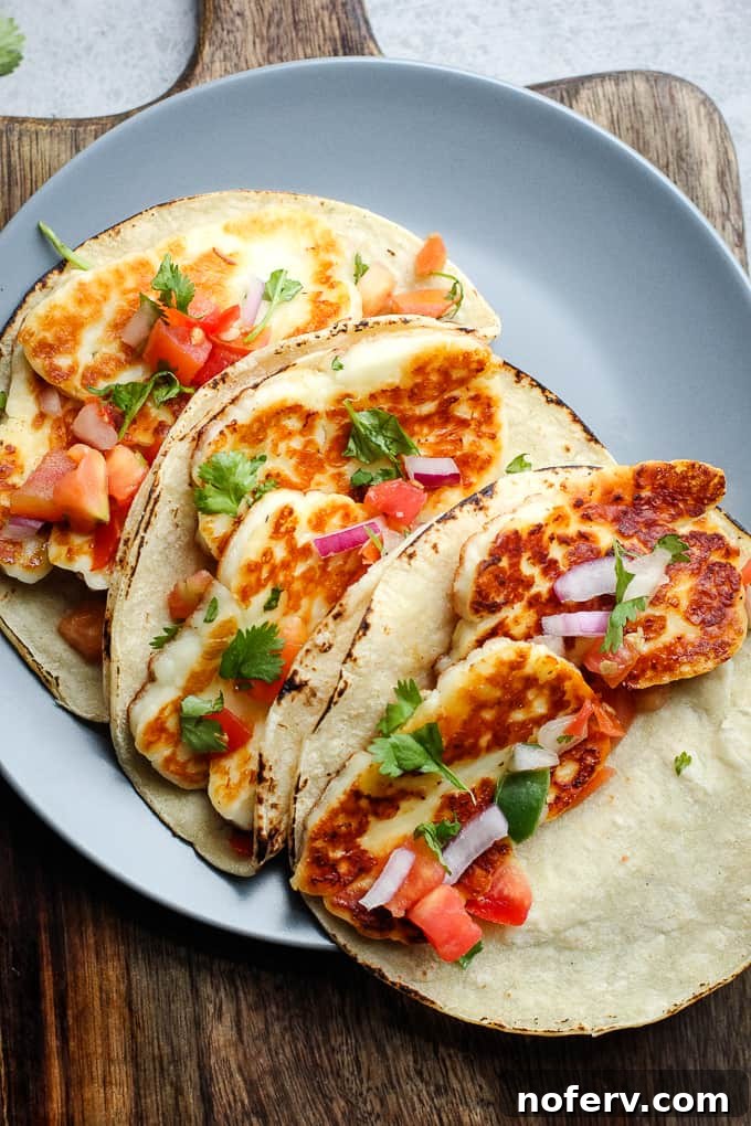 Delicious Easy Halloumi Tacos, filled with crispy halloumi and fresh toppings.