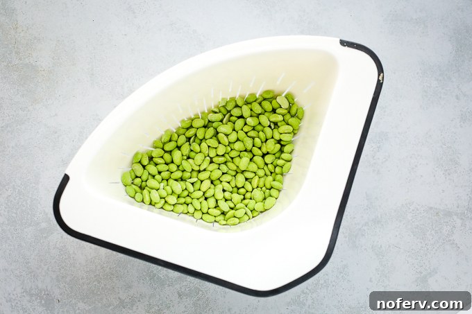 Golden Crispy Edamame Rice Bowls 3 Fresh edamame in a bowl