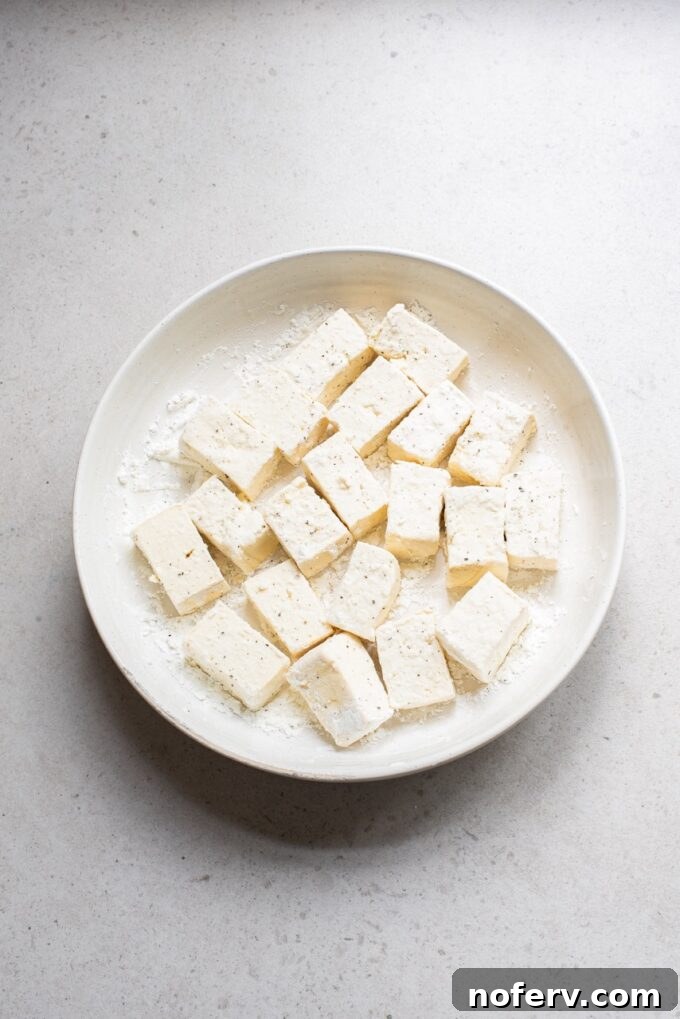 Effortless Sheet Pan Teriyaki Tofu 3 Pressed tofu tossed with cornstarch