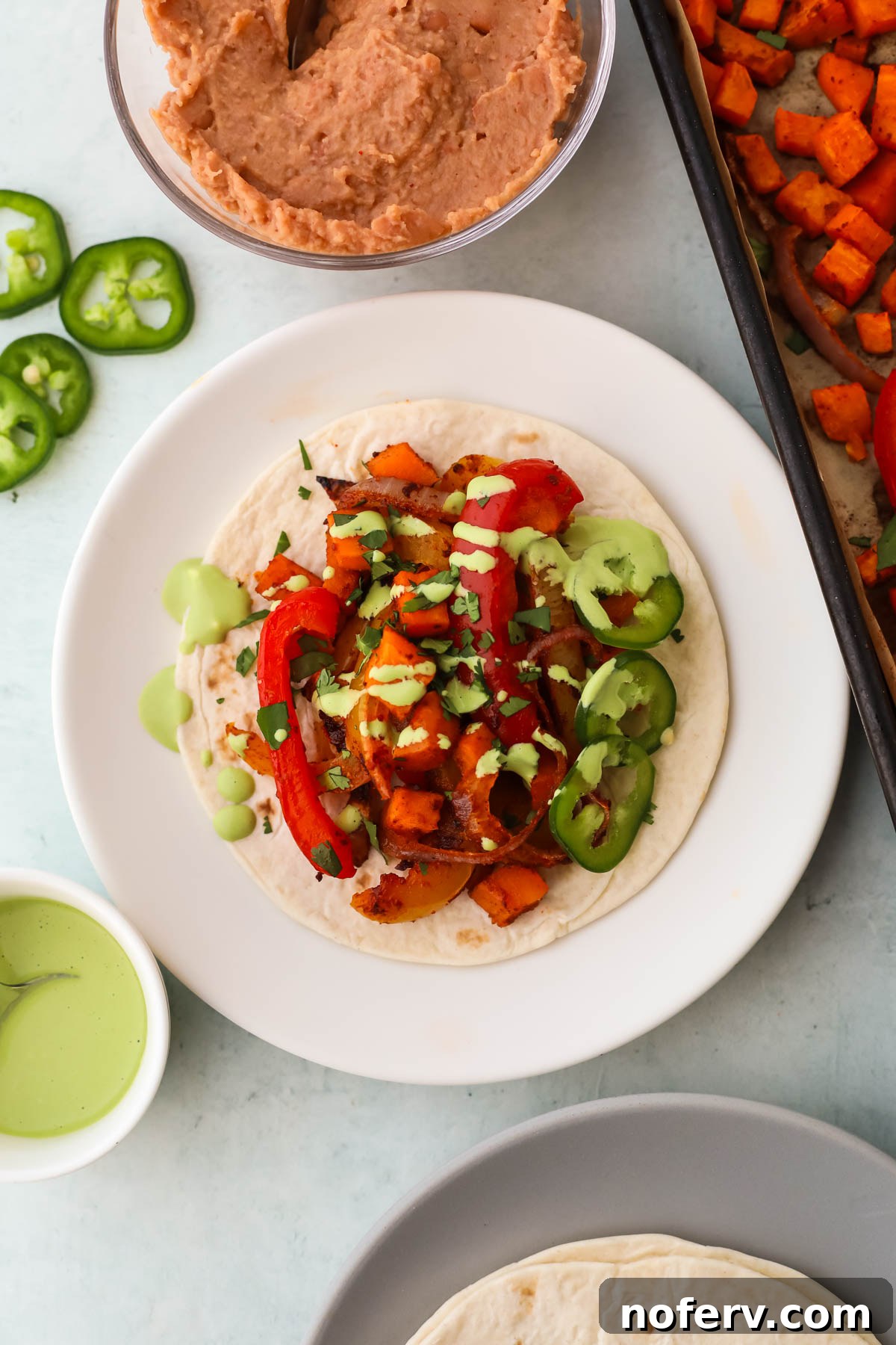 Sweet Potato Fajitas with Bell Peppers and Cilacha Lime Sauce 2 sweet potato fajitas