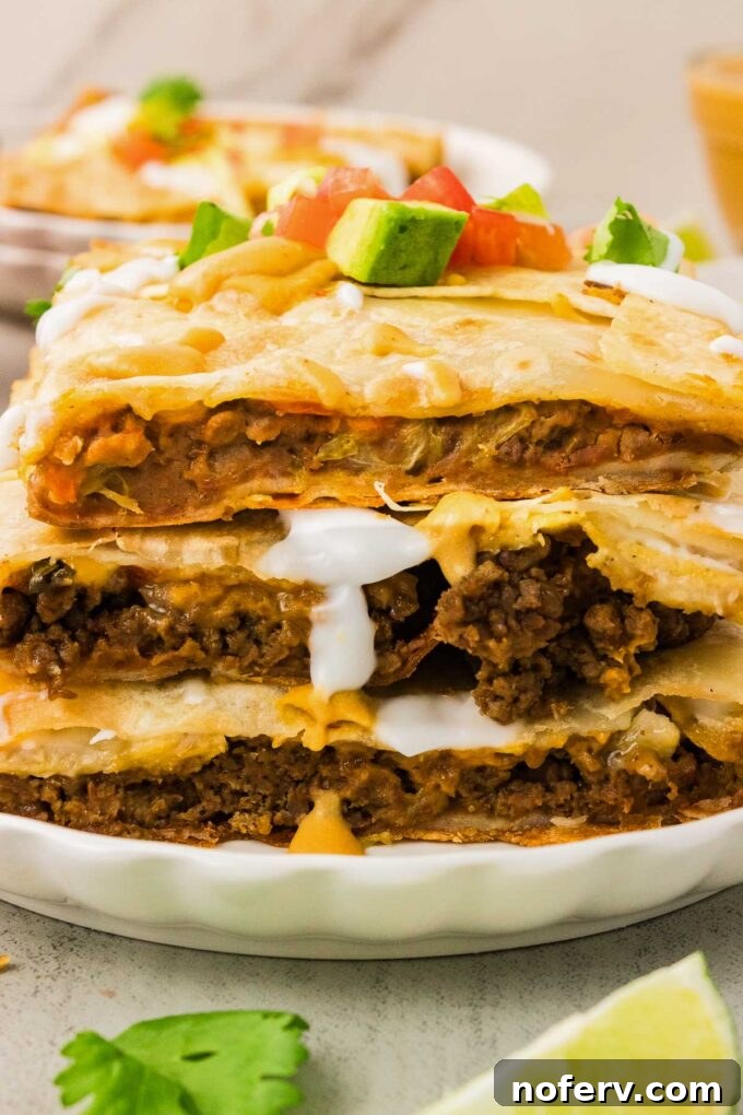 Loaded Vegetarian Crunchwrap Recipe: Quick Meatless Taco Wraps 11 Slice and serve with toppings