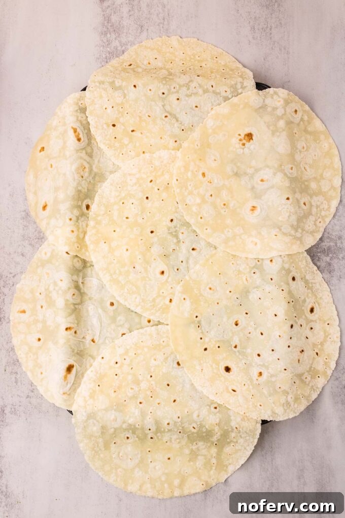 Loaded Vegetarian Crunchwrap Recipe: Quick Meatless Taco Wraps 4 Arrange tortillas around pan