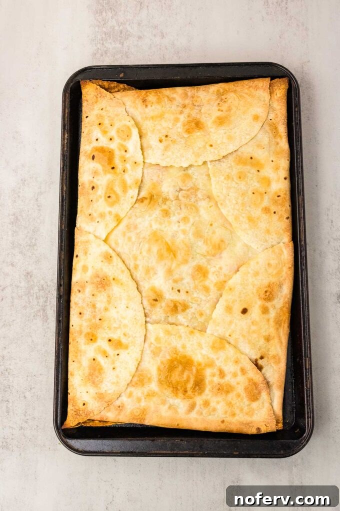 Loaded Vegetarian Crunchwrap Recipe: Quick Meatless Taco Wraps 10 Bake with another sheet pan on top