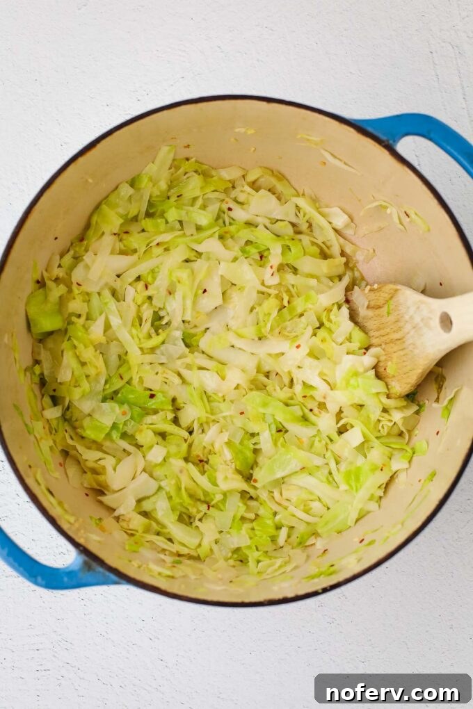 Hearty Cabbage and Rice Soup Recipe 2 Sautéing onion and cabbage