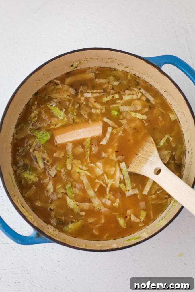 Hearty Cabbage and Rice Soup Recipe 4 Simmering the soup