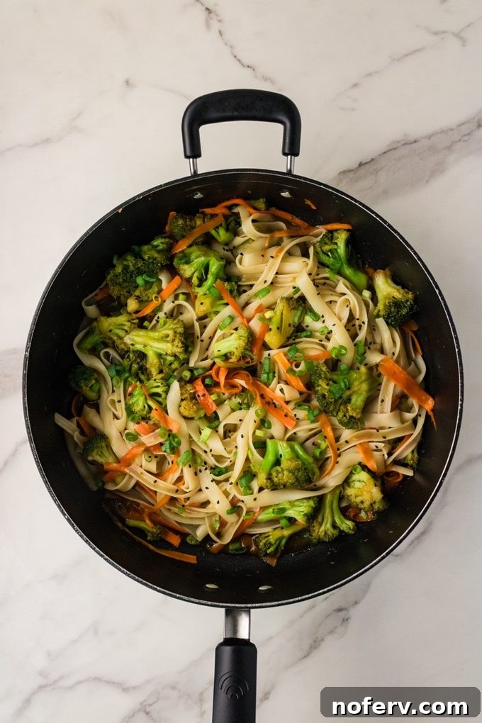 Sweet-Savory Teriyaki Rice Noodles with Veggies 9 Finished teriyaki noodles with sesame seeds