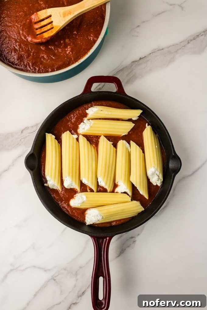 arrange manicotti in dish