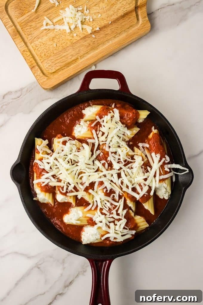 top with sauce and cheese
