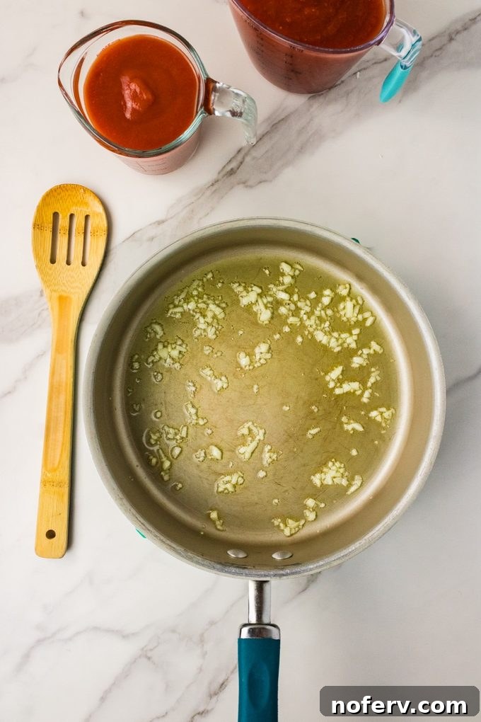 cook garlic in olive oil