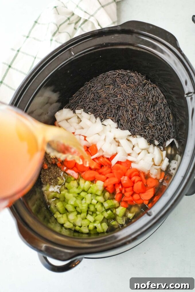 Creamy Slow Cooker Wild Rice Soup Recipe 3 Slow cooker with wild rice soup ingredients